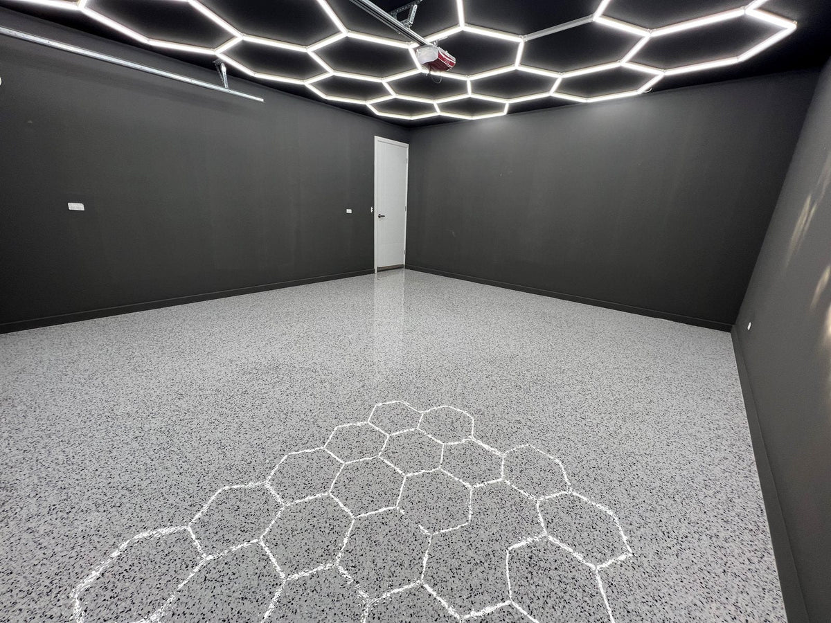 White HEXA hexagon LED lights installed across an Australian double garage ceiling