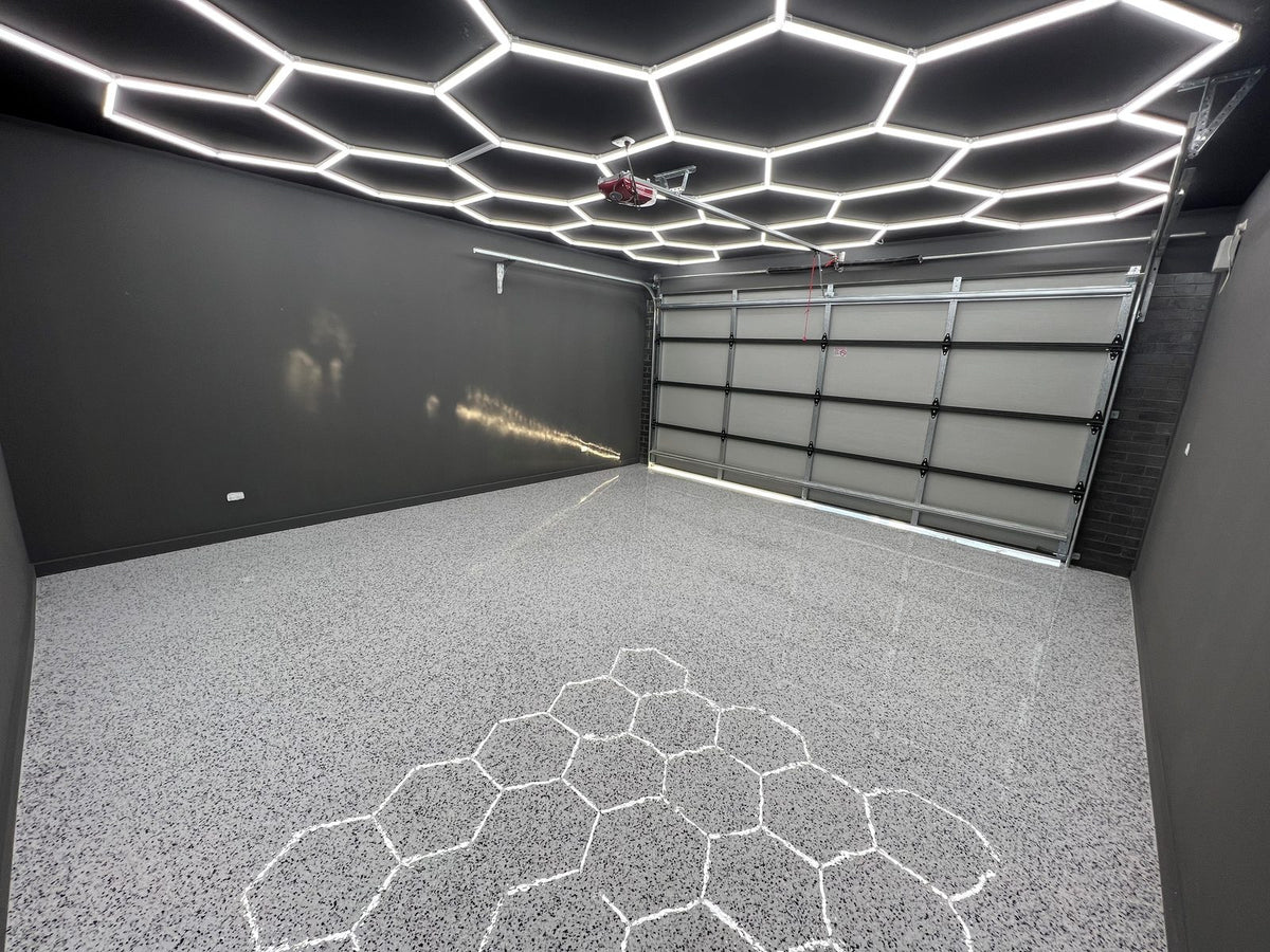 Modular hexagon LED ceiling lighting system installed in an Australian garage